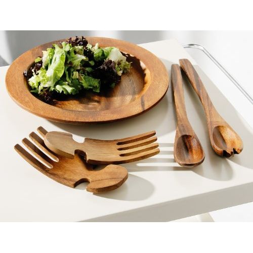 Ensemble couverts à salade en bois d'acacia artisanal, ergonomiques et solides pour cuisine écoresponsable et élégante.