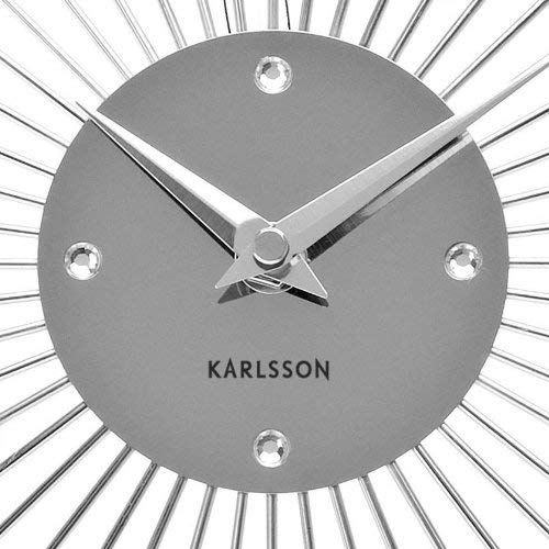 Horloge murale élégante Karlsson en métal argenté avec cristaux décoratifs pour intérieur moderne.
