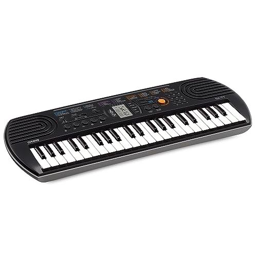 Mini Piano Casio SA-77 pour enfants et adultes, compact et transportable avec multiples fonctions.