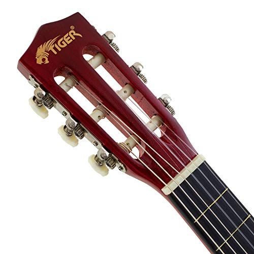 Guitare classique rouge Tiger pour enfants de 6 à 9 ans avec accessoires.