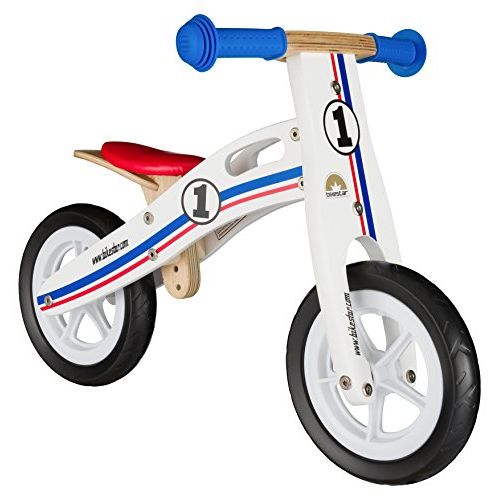 Draisienne en bois pour enfant dès 2 ans, stabilité rassurante, selle ajustable, matériaux non toxiques, idéale pour développer l'équilibre.