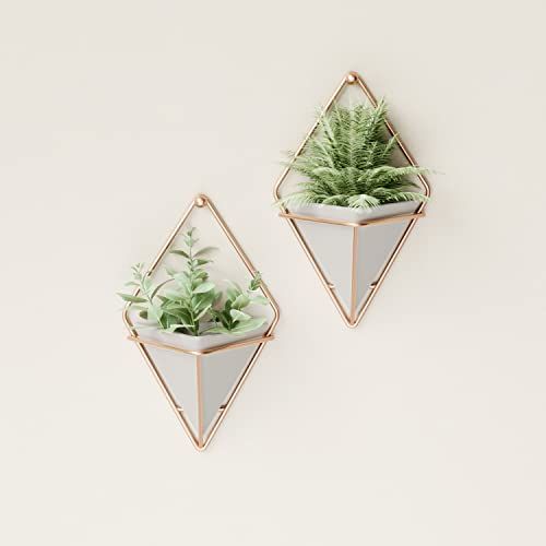 Set de 2 pots suspendus Umbra au design géométrique moderne pour décorer maison et bureau avec plantes ou organiser de petits objets.