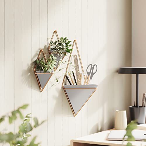 Set de 2 pots suspendus Umbra au design géométrique moderne pour décorer maison et bureau avec plantes ou organiser de petits objets.