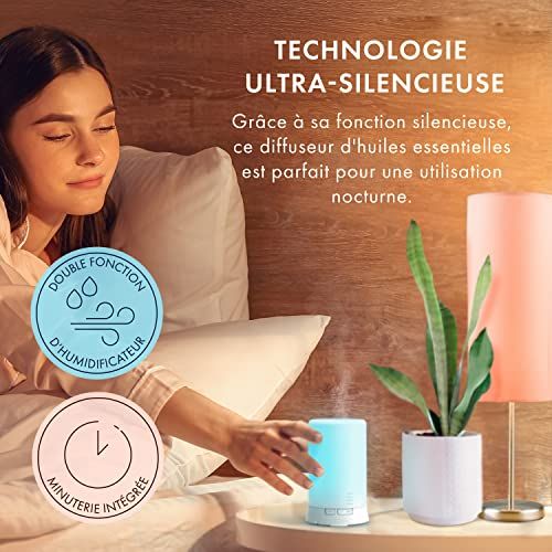 Diffuseur d'huiles essentielles ultrasonique avec lampes LED intégrées, minuterie programmable et fonctionnement silencieux.