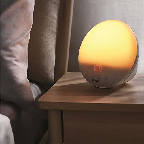 Réveil luminothérapie Philips - Réveillez-vous en douceur avec une simulation de lever de soleil et profitez d'un sommeil paisible avec une simulation de crépuscule. Design élégant et fonctionnalité polyvalente.