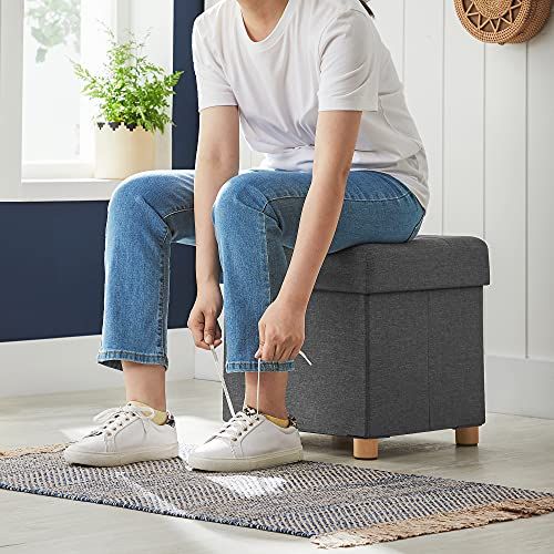 Pouf coffre de rangement élégant en tissu façon lin, avec capacité de 37L, pieds en bois antidérapants. Polyvalent pour rangement, siège et décoration intérieure.