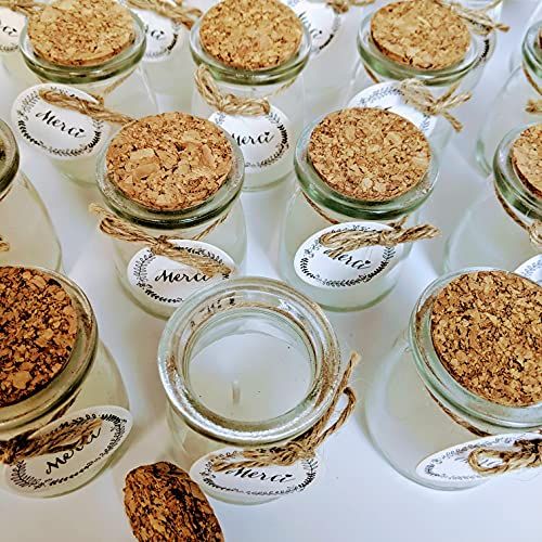 Lot de bougies en pot de verre avec message Merci, idéales pour mariages, anniversaires et décorations élégantes. Parfum apaisant, design raffiné.