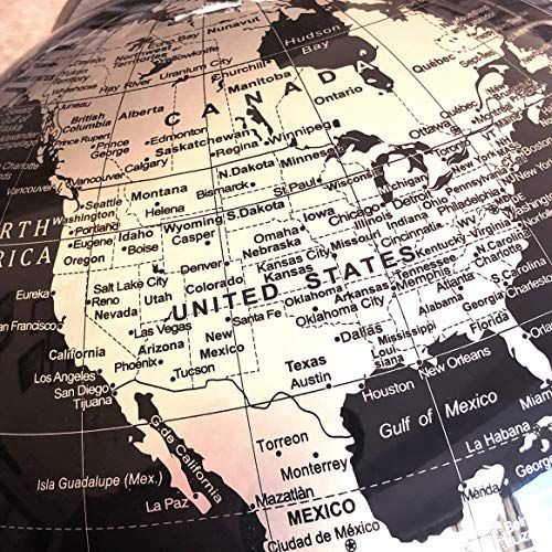 Globe terrestre métallique sur support élégant avec détails géographiques