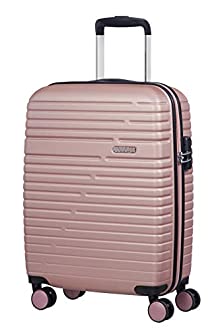 Une valise cabine rose 