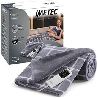 Couverture chauffante velours et sherpa avec technologie de température ajustable pour relaxation et confort à domicile.