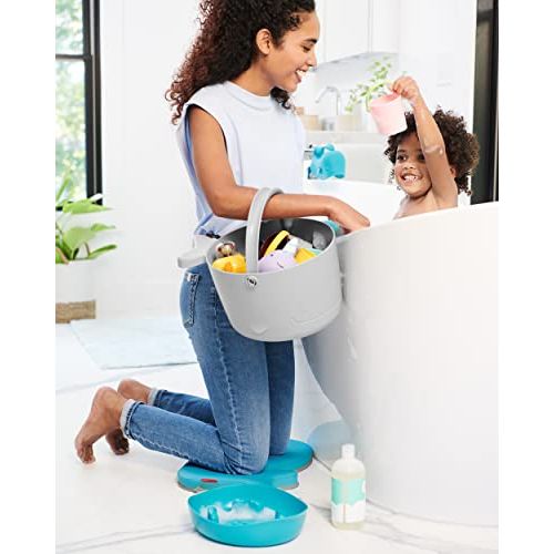 Range jouets de bain Skip Hop Moby avec système drainage et design marin pour hygiène et organisation salle de bain enfant.