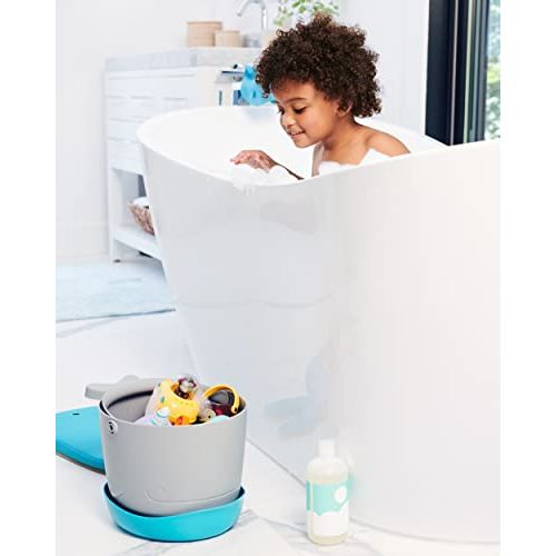 Range jouets de bain Skip Hop Moby avec système drainage et design marin pour hygiène et organisation salle de bain enfant.