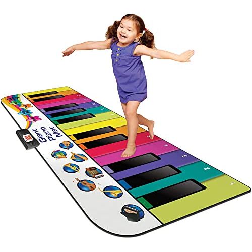 Enfant s'amusant sur piano de sol géant N-Gear coloré et interactif