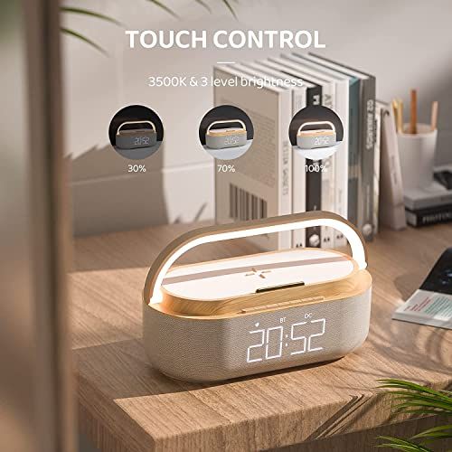 Radio-réveil digital élégant avec chargeur sans fil et fonctions Bluetooth, FM et lampe de nuit.