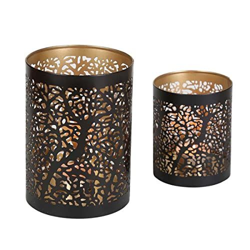 Photophore d'ambiance en métal ciselé, motifs créant des jeux d'ombre et de lumière, design estampillé Paisley.