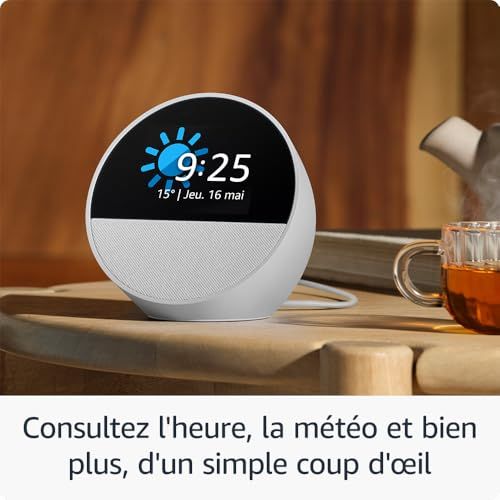 Enceinte connectée Echo Spot d'Amazon, réveil moderne avec Alexa, design compact, contrôle maison intelligente, qualité sonore exceptionnelle. Cadeau technologique idéal.