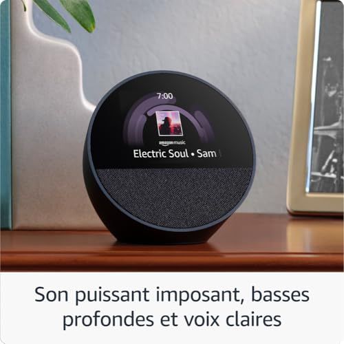 Enceinte connectée Echo Spot d'Amazon, réveil moderne avec Alexa, design compact, contrôle maison intelligente, qualité sonore exceptionnelle. Cadeau technologique idéal.