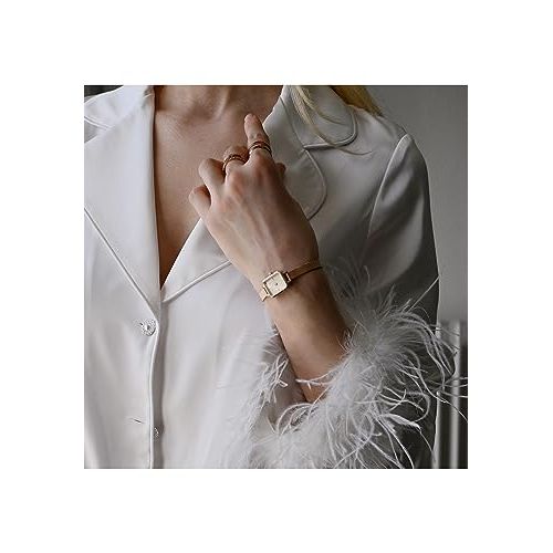 Montre Daniel Wellington élégante, minimaliste, en acier inoxydable, parfaite comme cadeau raffiné pour toutes occasions spéciales.
