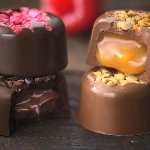 Calendrier de l'Avent Chocolats, Les Recettes de l'Atelier, gourmandises chocolatées, production durable, fèves certifiées Rainforest Alliance, plaisir festif, idée cadeau Noël.