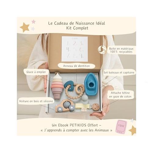 Coffret cadeau naissance Petikids avec 5 jeux Montessori en bois et silicone, favorisant éveil, motricité et détente des tout-petits. Idéal pour baptême.