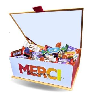 Boîte de chocolats colorée avec inscription MERCI