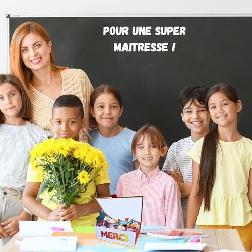 Boîte de chocolats colorée avec inscription MERCI