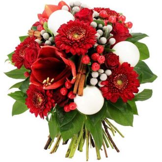 Bouquet de fleurs de Noël rouge et blanc avec germinis, roses, amaryllis et décorations festives.