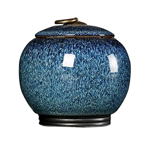 Boîte décorative étanche en bois pour thé et herbes, motif unique.